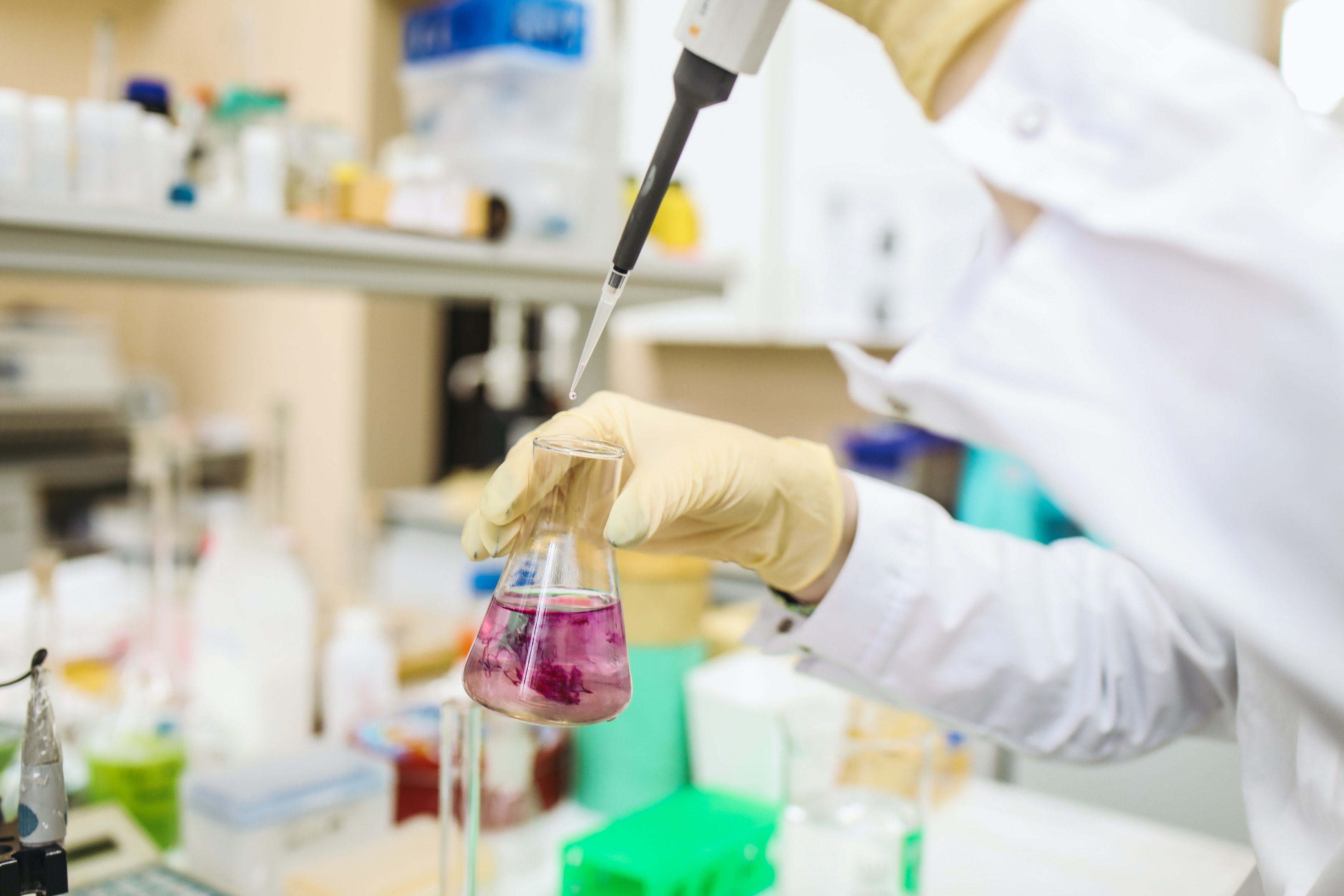 pipette and beaker in lab